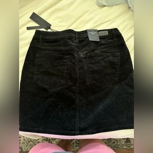 Black corduroy mini skirt